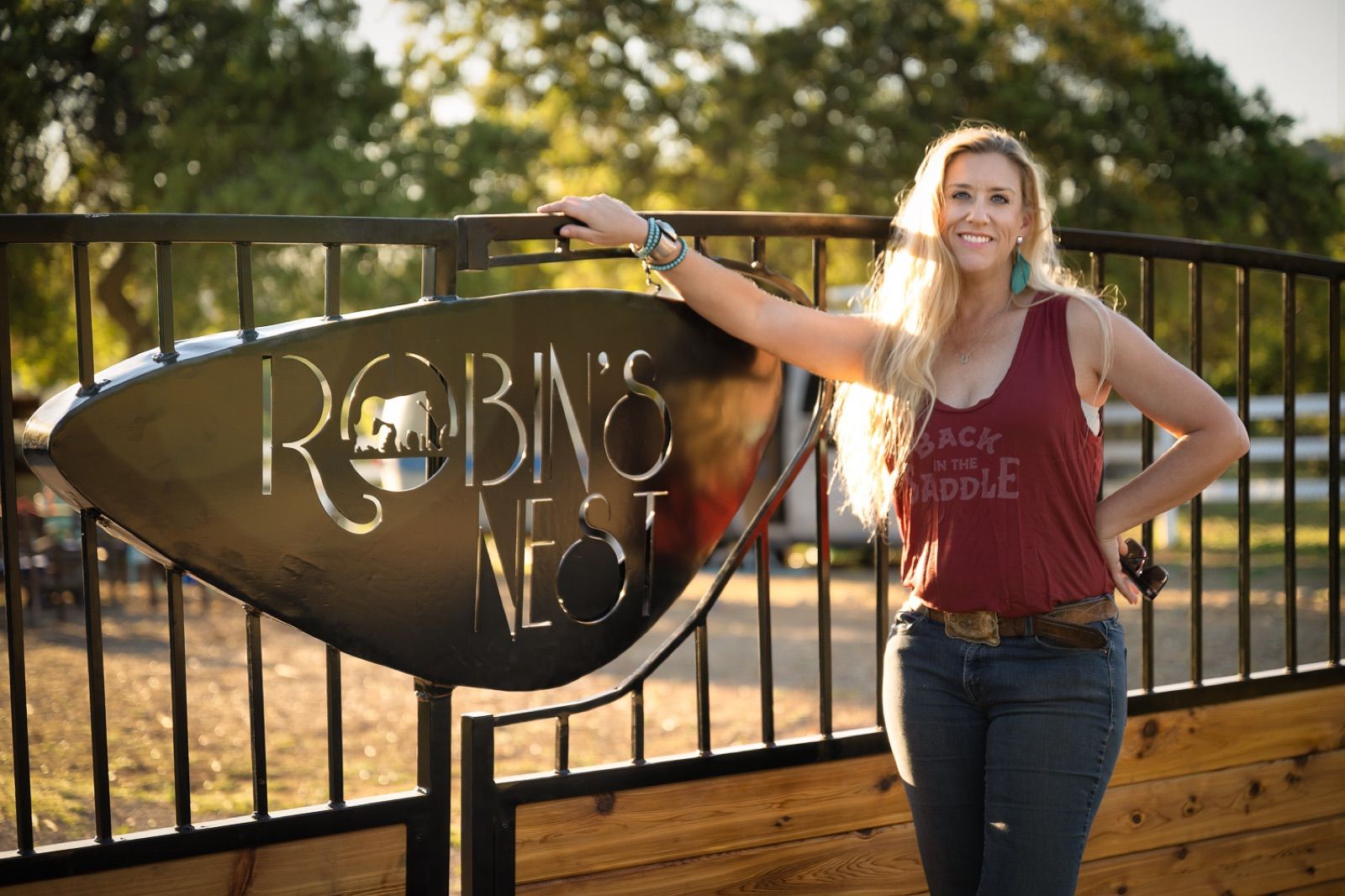 Founder Kimber Williams with rescued animals at Robin's Nest.